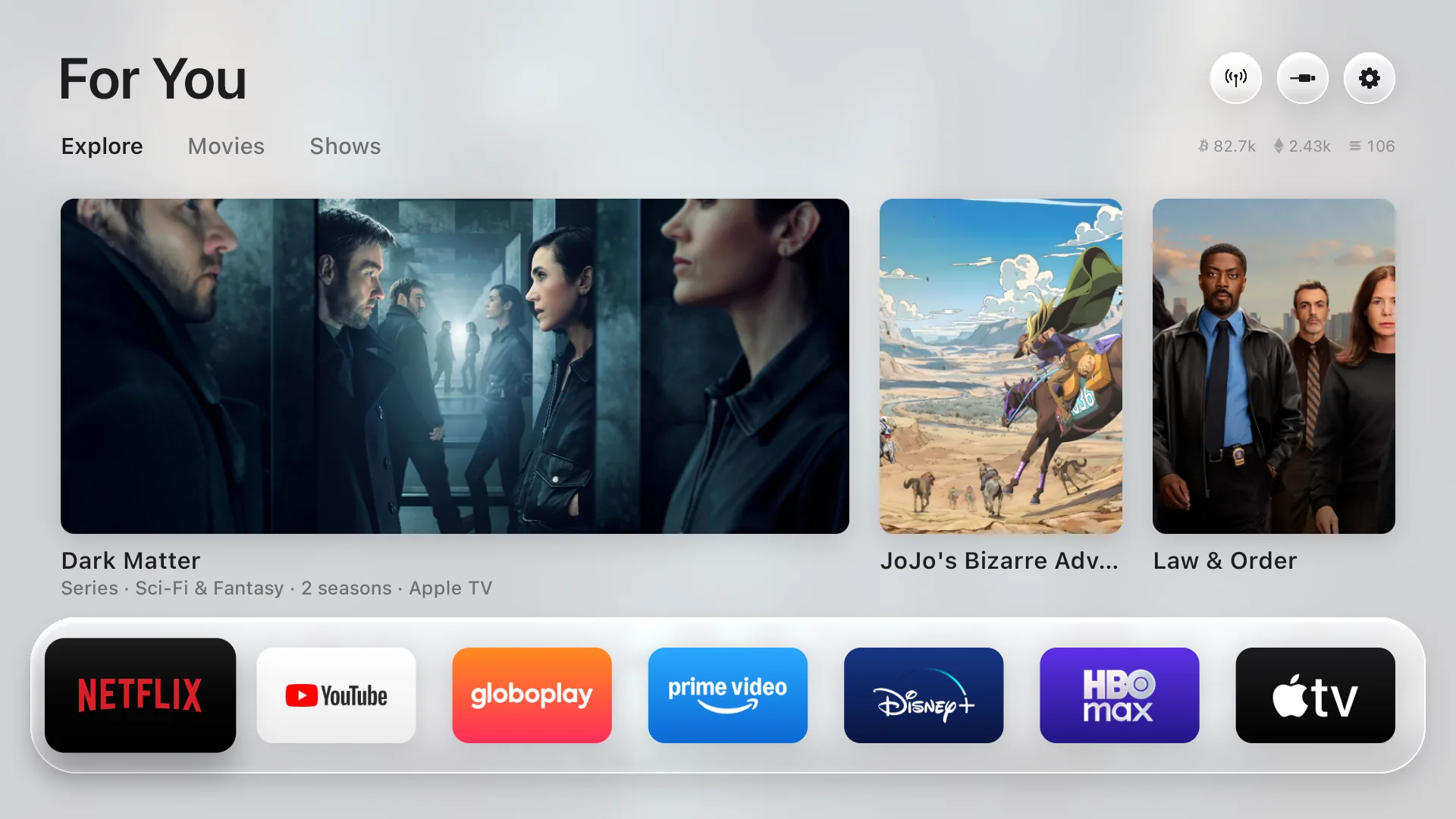 The Free Yuh TV home screen: picks from your own apps, a glass shelf of apps